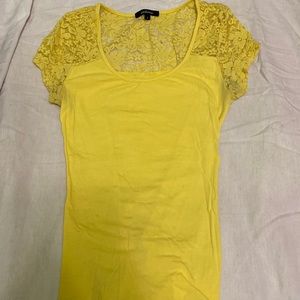 Yellow top, tight fit, waist/hip length, lace on top area, size small